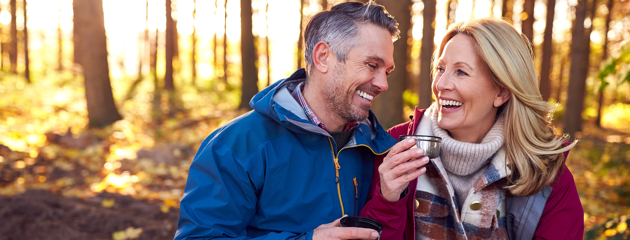 An older couple celebrates the arrival of fall at Lake Arrowhead Lodge