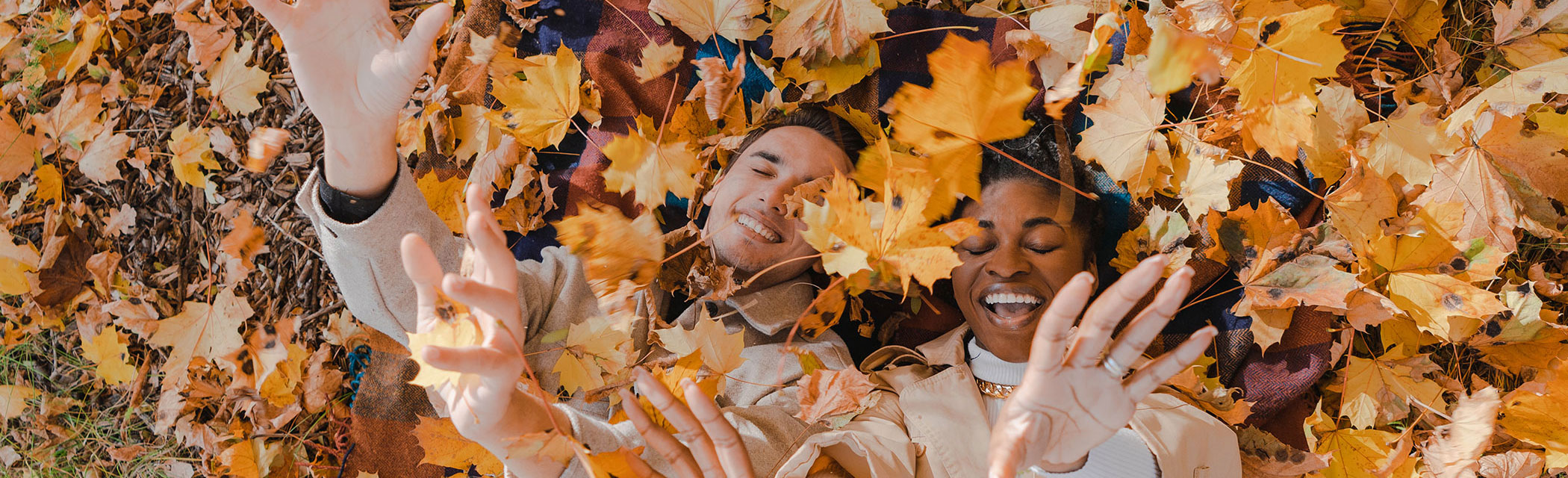 A couple celebrates the fall colors at UCLA Lake Arrowhead Lodge