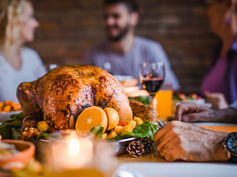 a family enjoys a thanksgiving feast