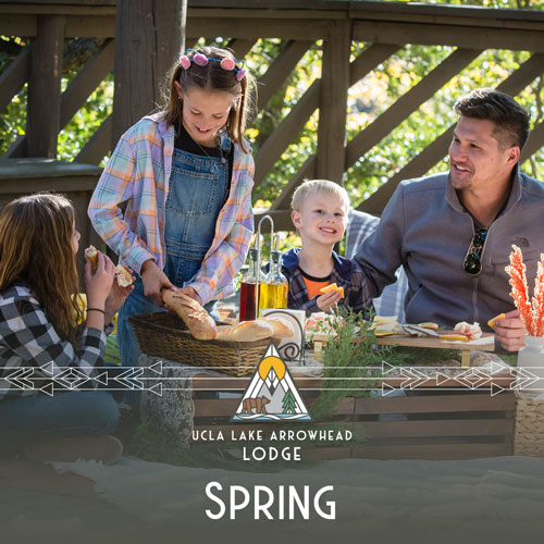 A family enjoys the spring weather with a picnic lunch upgrade at lake arrowhead lodge