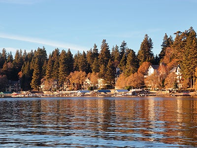 Fall colors reflect against the shimmering waters of Lake Arrowhead