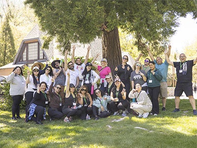 Happy team members wrap up their team building moment